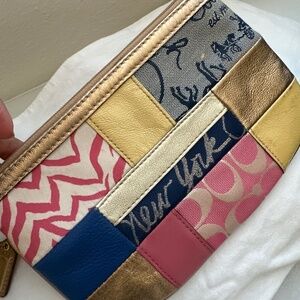 Wristlet patchwork de Coach